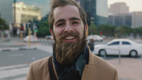 close-up-portrait-of-happy-young-bearded-hipster-man-smiling-cheerful-enjoying-city-urban-lifestyle-commuting