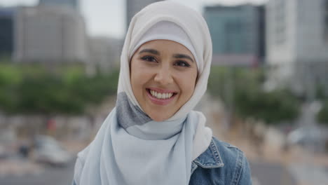portrait-young-happy-muslim-woman-laughing-enjoying-successful-urban-lifestyle-independent-female-student-wearing-hijab-headscarf-in-city-real-people-series