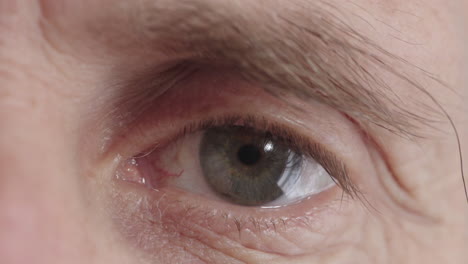 senior-man-eye-opening-looking-at-camera-beautiful-iris-macro-close-up