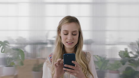 portrait-of-beautiful-blonde-business-woman-intern-enjoying-texting-browsing-social-media-using-smartphone-mobile-technology
