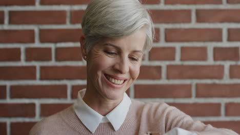 portrait-beautiful-middle-aged-woman-using-smart-watching-checking-messages-laughing-enjoying-mobile-technology-connection