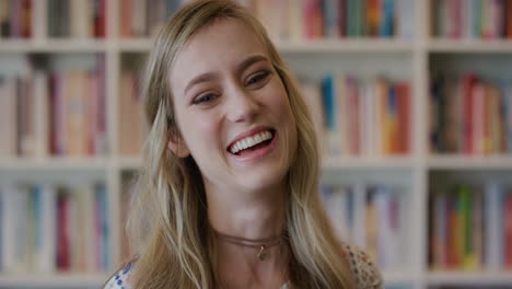 portrait-young-beautiful-blonde-woman-student-laughing-enjoying-successful-lifestyle-happy-cheerful-college-girl-in-bookshelf-background-slow-motion