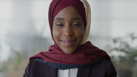 close-up-portrait-successful-black-business-woman-smiling-enjoying-professional-management-career-beautiful-african-american-muslim-female-wearing-hijab-in-office
