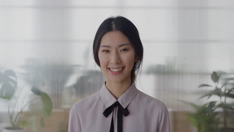 portrait-young-asian-business-woman-intern-smiling-cheerful-enjoying-professional-career-beautiful-ethnic-female-in-office-slow-motion