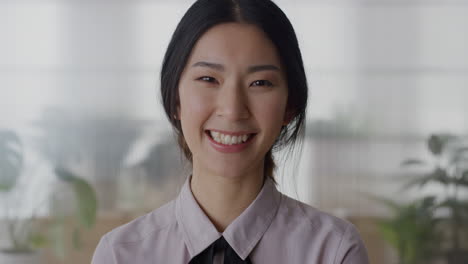 portrait-young-asian-business-woman-intern-laughing-cheerful-enjoying-professional-career-beautiful-ethnic-female-in-office-slow-motion