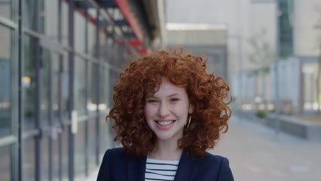portrait-young-stylish-business-woman-laughing-cheerful-red-head-enjoying-professional-urban-lifestyle-in-city-happy-successful-female-executive-slow-motion