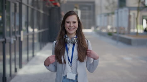 portrait-young-lively-business-woman-student-smiling-excited-enjoying-professional-urban-lifestyle-success-in-city-slow-motion-corporate-intern