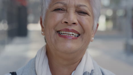 close-up-portrait-middle-aged-indian-woman-laughing-enjoying-successful-lifestyle-professional-senior-female-in-city-slow-motion-real-people-series