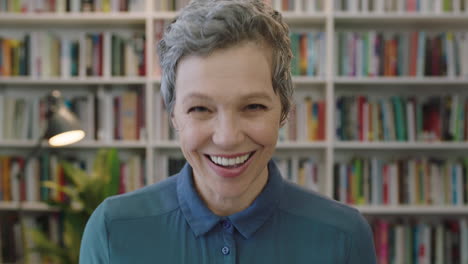 portrait-of-mature-excited-caucasian-woman-librarian-laughing-cheerful-enjoying-career-education-milestone-cheerful-middle-aged-female-in-library-background