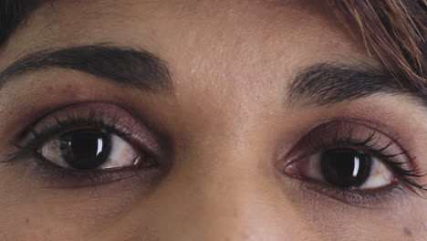 close-up-hispanic-woman-eyes-opening-wearing-makeup-looking-at-camera-beauty-cosmetics-macro