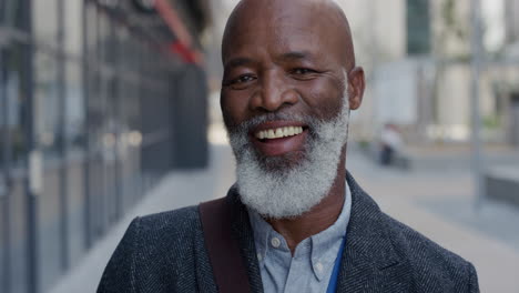 portrait-happy-senior-african-american-businessman-laughing-in-city-enjoying-professional-urban-lifestyle-cheerful-black-man-commuter-slow-motion