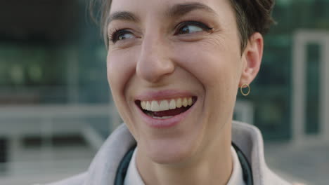 portrait-of-successful-caucasian-business-woman-intern-laughing-cheerful-close-up-of-smartphone