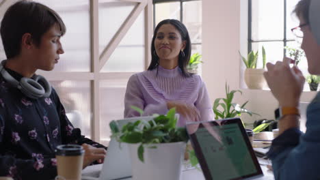 young-group-of-students-meeting-mixed-race-team-leader-woman-sharing-creative-ideas-enjoying-conversation-friends-discussing-business-project-in-modern-office-workplace