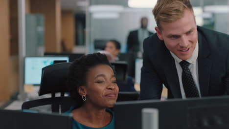 businessman-meeting-with-colleague-using-computer-team-leader-man-pointing-at-screen-helping-coworker-discussing-strategy-in-corporate-workplace