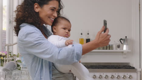 happy-mother-and-baby-having-video-chat-using-smartphone-mom-holding-toddler-enjoying-mobile-technology-sharing-motherhood-lifestyle-with-friend-on-social-media