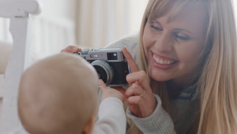 happy-mother-taking-photo-of-baby-using-camera-excited-mom-photographing-cute-toddler-enjoying-motherhood-lifestyle-making-memories