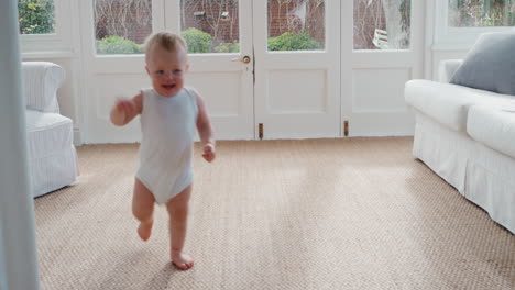 happy-baby-boy-toddler-exploring-home-having-fun-curious-infant-walking-through-house-enjoying-childhood-4k-footage