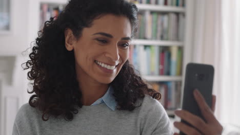 happy-woman-having-video-chat-using-smartphone-waving-hand-greeting-friend-enjoying-conversation-chatting-on-mobile-phone-at-home-4k-footage