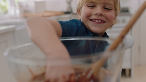 naughty-little-boy-dipping-hand-into-bowl-of-chocolate-sauce-smiling-sneaky-child-having-fun-in-kitchen