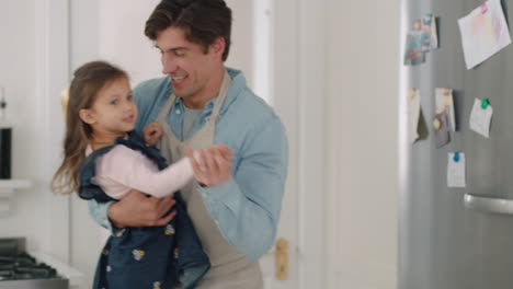 happy-family-dancing-in-kitchen-father-having-fun-dance-with-little-girl-enjoying-exciting-weekend-at-home-4k-footage
