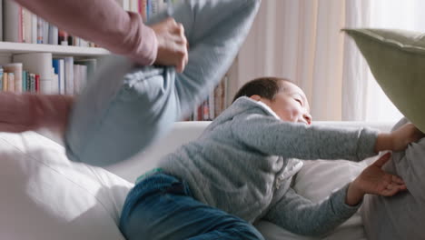 happy-asian-family-having-pillow-fight-mother-and-father-enjoying-playing-with-children-at-home-having-fun-together-on-weekend-4k-footage