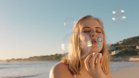 beautiful-woman-blowing-bubbles-on-beach-at-sunset-enjoying-summer-having-fun-on-vacation-by-the-sea