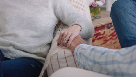 close-up-old-couple-holding-hands-gently-touching-sharing-romantic-connection-expressing-love-after-long-marriage-kindness-forgiveness-concept-4k-footage