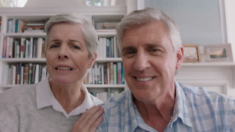 happy-old-couple-having-video-chat-using-webcam-waving-at-grandchildren-enjoying-chatting-to-family-online-sharing-lifestyle-relaxing-at-home-on-retirement-4k
