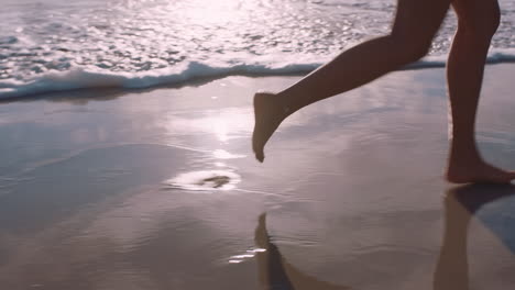 close-up-woman-feet-walking-barefoot-on-beach-at-sunset-enjoying-waves-splashing-gently-female-tourist-on-summer-vacation