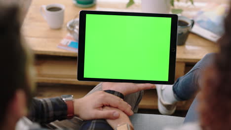 close-up-couple-hands-using-digital-tablet-computer-watching-green-screen-entertainment-on-mobile-device-enjoying-relaxing-at-home-viewing-chroma-key