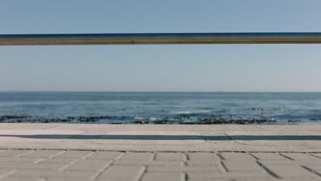 woman-legs-walking-on-seaside-pier-enjoying-relaxing-summer-vacation-in-beautiful-ocean-background