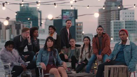 group-of-young-friends-hanging-out-on-rooftop-party-at-sunset-looking-confident-in-urban-city-gen-z-concept