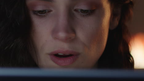 close-up-portrait-attractive-woman-using-tablet-computer-browsing-online-watching-movie-at-night-enjoying-entertainment