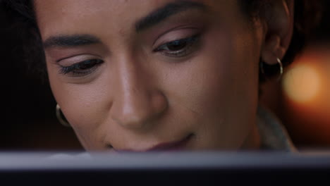 close-up-portrait-attractive-woman-using-tablet-computer-watching-movie-at-night-looking-at-screen-enjoying-entertainment-online-drinking-coffee