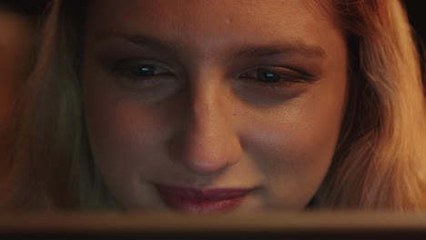 close-up-portrait-beautiful-woman-using-tablet-computer-watching-movie-laughing-enjoying-comedy-entertainment-relaxing-at-home