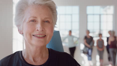 portrait-happy-elderly-caucasian-woman-enjoying-yoga-class-smiling-cheerful-middle-aged-female-practicing-healthy-fitness-lifestyle-in-workout-studio