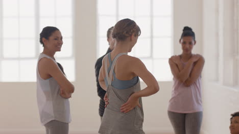 healthy-group-of-women-in-yoga-class-enjoying-conversation-sharing-lifestyle-discussing-fitness-practice-chatting-in-studio