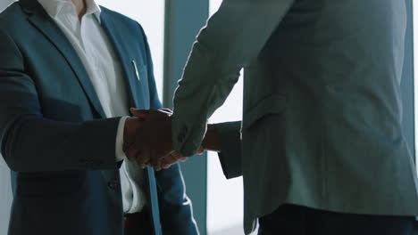 business-people-shaking-hands-in-boardroom-corporate-partnership-deal-welcoming-opportunity-for-cooperation-in-office-4k