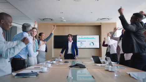 funny-businessman-celebrating-in-boardroom-successful-corporate-victory-colleagues-applause-in-office-meeting-enjoying-winning-success-4k