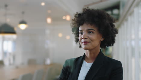 portrait-successful-business-woman-smiling-confident-with-arms-crossed-enjoying-corporate-leadership-young-female-executive-planning-ahead-for-positive-future-in-office-4k-footage