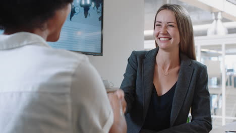 successful-job-interview-beautiful-business-woman-intern-shaking-hands-with-manager-in-meeting-congratulations-for-new-career-opportunity-in-corporate-office