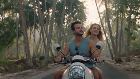 travel-couple-riding-motorcycle-on-tropical-island-exploring-beautiful-travel-destination-having-fun-ride-on-scooter