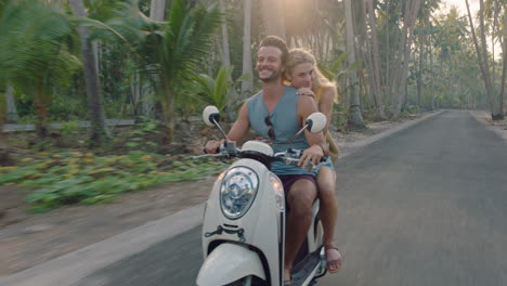travel-couple-riding-motorcycle-on-tropical-island-exploring-beautiful-travel-destination-having-fun-ride-on-scooter