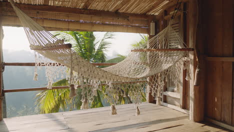 hammock-swinging-empty-cabin-at-tropical-hotel-resort-summer-vacation-in-paradiseexotic-travel-lifestyle-concept-no-people-4k
