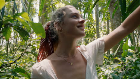 beautiful-woman-walking-in-forest-exploring-lush-tropical-rainforest-alone-enjoying-beauty-of-nature-lost-on-spiritual-journey