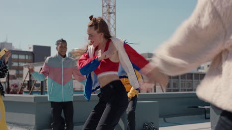 funny-woman-dancing-with-friends-on-rooftop-at-dance-party-enjoying-crazy-celebration-girl-performing-fun-dance-moves