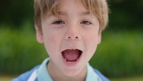 portrait-cute-little-boy-making-faces-having-fun-happy-kid-enjoying-making-silly-expressions-in-sunny-park-4k