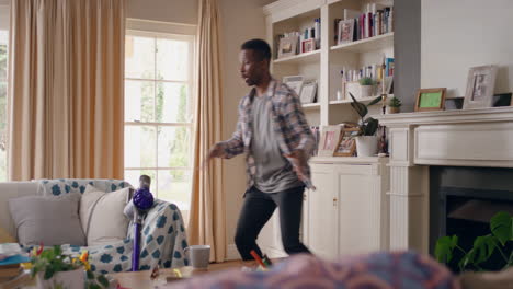happy-african-american-man-dancing-at-home-celebrating-success-having-fun-crazy-dance-in-living-room-enjoying-lifestyle-freedom-on-weekend-4k