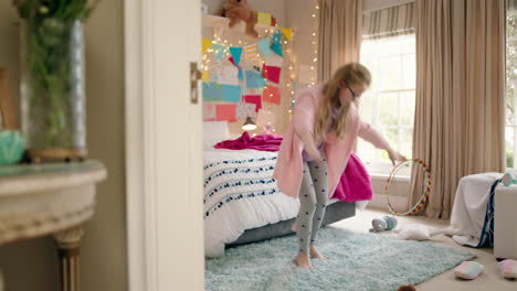 happy-little-girl-dancing-in-bedroom-practicing-ballet-dance-moves-having-fun-playing-pretend-wearing-pajamas-enjoying-weekend-at-home