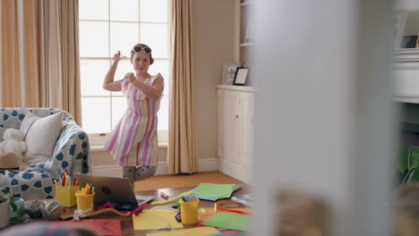 happy-little-girl-dancing-at-home-having-fun-playful-dance-enjoying-childhood-wearing-colorful-dress-4k
